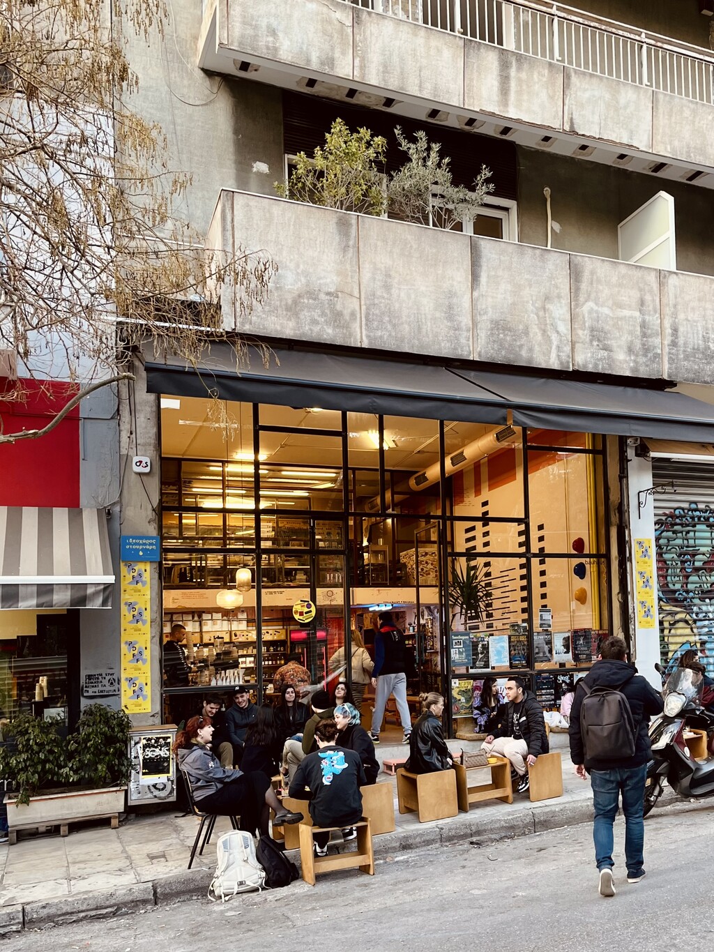 People sitting in front of behold theman.